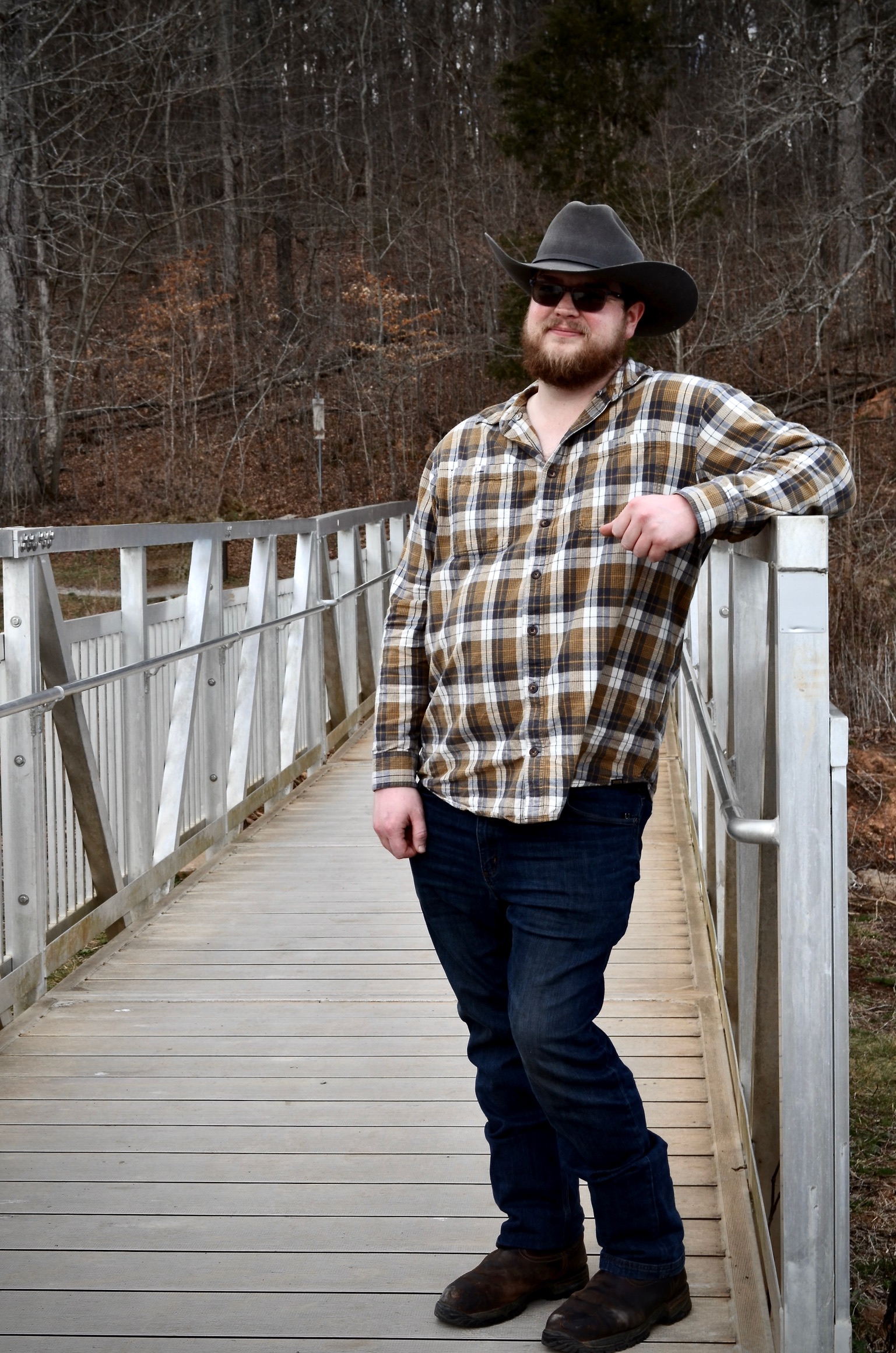 David Sutman Jr. standing on a bridge in Tennessee